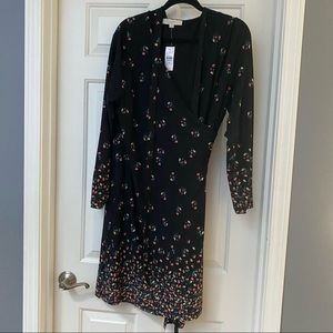 NWT. Black wrap dress with floral pattern